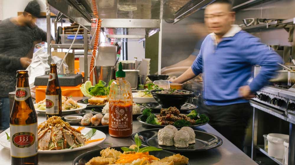 Mister Minh in kitchen